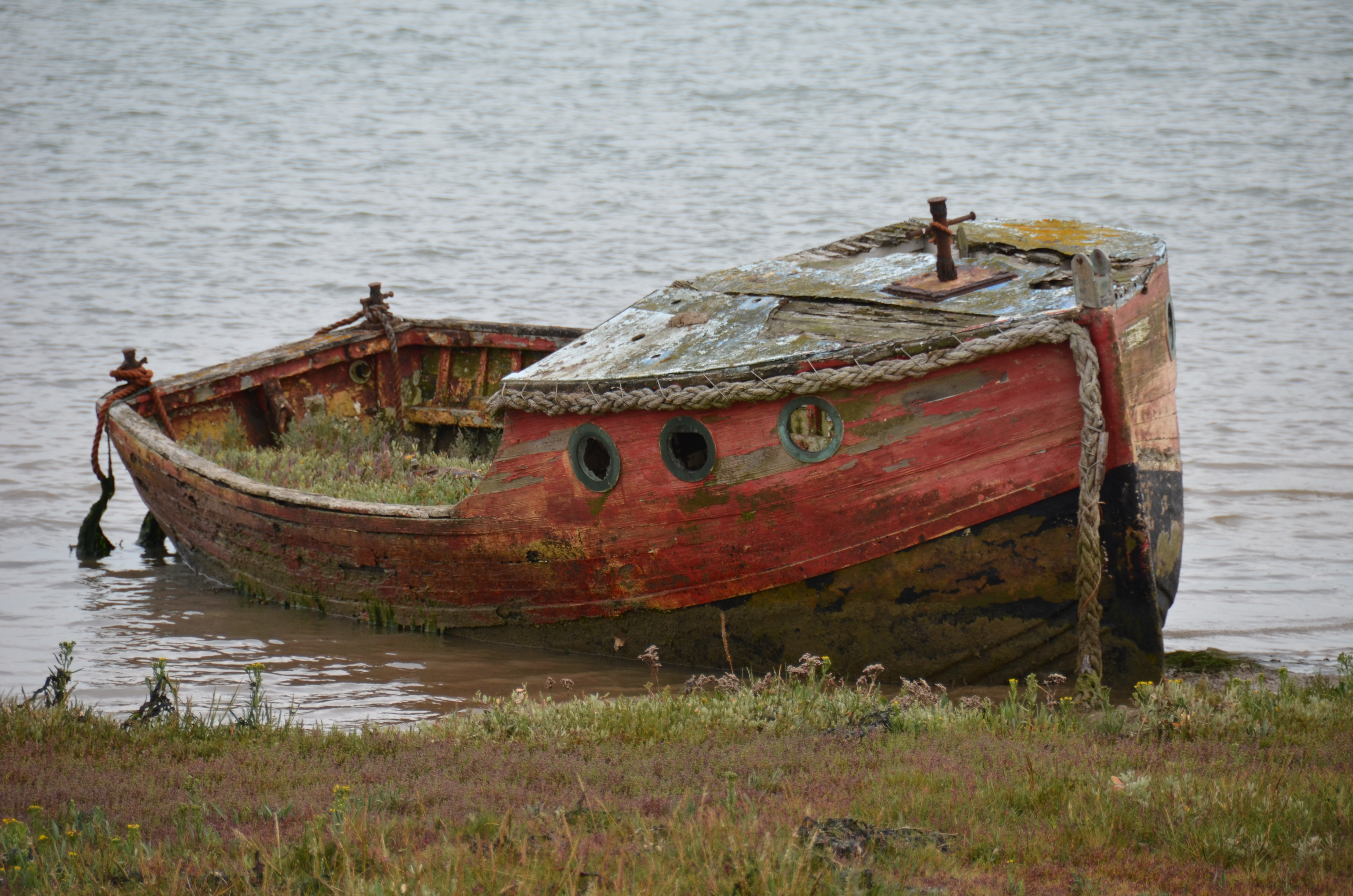 Abandoned boat on the River Alde, Orford, Suffolk, United Kingdom